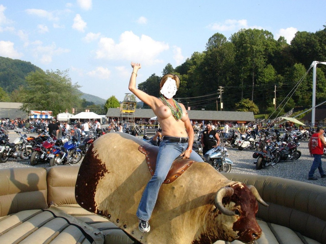 Topless bull ride at cherokee bike rally